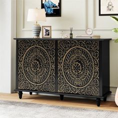 a black and gold sideboard in a living room