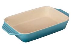 a blue casserole dish on a white background