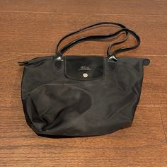 Black Bag With Black Patent Handles. Worn Has A Few Spots, Needs A Cleaning But Still In Good Condition! Lf Longchamp Le Pliage Black, Black City, Longchamp Bags, Black Bag, Longchamp Le Pliage, Handles, Bag Lady, Shoulder Bag, Women Shopping