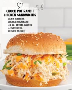 a chicken sandwich on a bun with cheese and lettuce is shown in this ad for crock pot ranch sandwiches