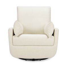 a white chair with two pillows on it's back and one arm facing the camera