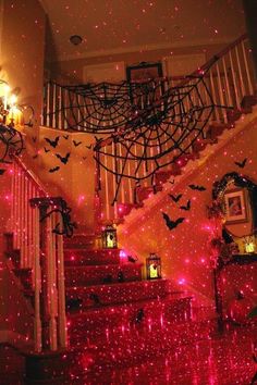 the stairs are decorated with red lights and bats