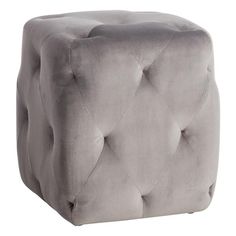 a square grey ottoman with buttons on the front and back legs, sitting against a white background