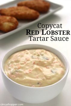 an advertisement for red lobster tartar sauce on a plate with fried food in the background