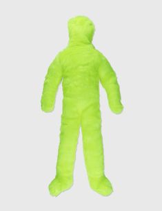 a neon green teddy bear is hanging from the ceiling in front of a white background