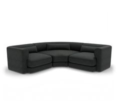 a black curved couch on a white background