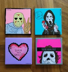 four painted coasters with cartoon characters on them