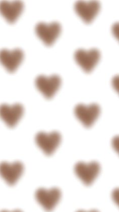 a white background with brown hearts on it