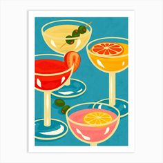 three martinis with olives and an orange on the rim are shown in this art print