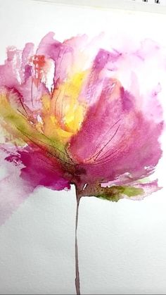 a watercolor painting of a pink flower