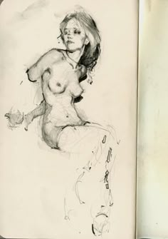 a pencil drawing of a naked woman sitting on top of a book open to the page