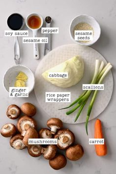 the ingredients to make mushroom soup on a white plate