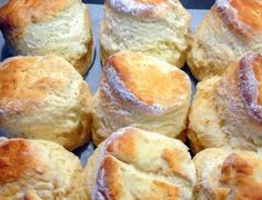 a bunch of rolls that are sitting in a pan