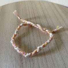 A Handmade Bracelet Or Anklet Woven With Shades Of White, Pink, And Yellow Colors. A Friendship Or Statement Bracelet Perfect For This Summer! Approx. 9 Inches/ 30 Centimeters Long. 10 Woven Bracelets For $25. Tory Burch Bracelet, Kate Spade Bangle, Blue Stone Necklace, Handmade Jewelry Bracelets, Wood Bracelet, Friend Bracelets, Woven Bracelet, Crystal Bangle, Handcrafted Bracelets