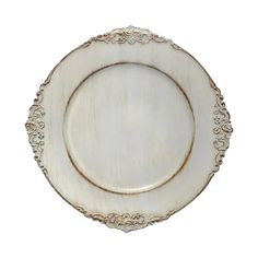 a white plate with gold trimmings on the edge and an oval design in the middle