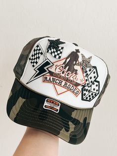 This custom made trucker patch hat is perfect for any occasion whether it be for spring/summer time, a lake hat, a gift for someone, or just a cute accessory to add a little spice to your outfit 🧢✨ DETAILS-  * This hat is one size with an adjustable SnapBack that is adjustable from 20in. - 23.5in. * The color of this hat is Camo Green & White * The material of the hat is polyester with iron on patches  REFUNDS AND CANCELLATIONS- Every hat is handmade by me as a result, a slight variation can oc Cheap Trucker Hat As Gift, Cheap Logo Patch Trucker Hat, Cheap Trucker Hat With Letter Patch, Sublimation Hat Patch Ideas, Spring Western Trucker Hat, Country Style Summer Baseball Cap, Summer Country Style Baseball Cap, Summer Trucker Hat With 5-panel Design, Summer Trucker Hat 5-panel Style