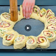 a video demonstrating how to make a ham and cheese roll wreath