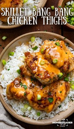 two plates filled with chicken and rice covered in sauce