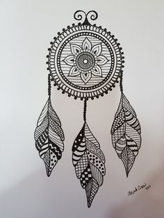 a drawing of a black and white dream catcher