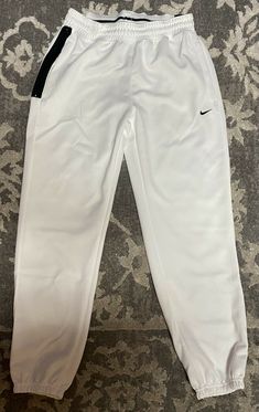 Brand: Nike Size: Mens Small Color: White/Black Condition: Brand new with tags Description: Nike Dri-Fit Spotlight Basketball Pants Terms & Conditions: All sales are final. Shipping: $5 with free tracking number within US. International Standard Shipping $25. Nike White Sweatpants For Spring, Sporty White Straight Leg Pants, White Sporty Straight Leg Pants, White Straight Leg Athleisure Pants, White Straight Leg Joggers For Spring, White Straight Leg Spring Joggers, White Straight-leg Joggers For Spring, Nike White Joggers For Spring, Sporty White Straight Leg Joggers