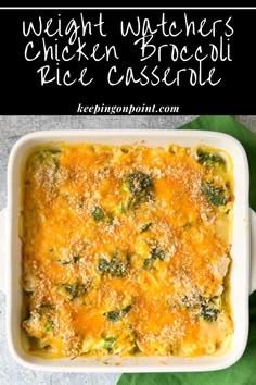 a casserole dish with broccoli and cheese in it on a table