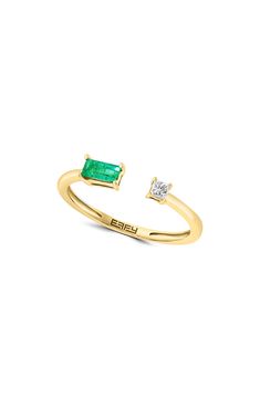 Add a dainty touch to your ensemble with this 14-karat yellow-gold bypass ring featuring a sparkling diamond and emerald. 0.13" band width Total diamond weight: 0.06ct. Total emerald weight: 0.19ct. 14K yellow gold/diamond/emerald Made in the USA Diamond Guide Dainty Emerald Ring, Emerald Ring Design, Diamond Emerald Ring, Asymmetrical Ring, Bypass Ring, Diamond Guide, Sparkling Diamond, Rings Simple, Emerald Ring