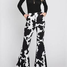 Brand New With Tags Black Cowprint Flare Pants Chic Printed Fall Pants, Chic Printed Pants For Fall, Stretch Printed Pants For Fall, White Stretch Printed Pants, Black Stretch Printed Pants, Black Printed Wide-leg Pants, Chic High-waisted Printed Pants, Trendy Black And White Bottoms For Spring, Spring Black Printed Pants