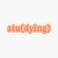 an orange sticker with the word studying in pink lettering on it, against a white background