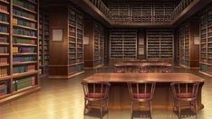 an empty library with tables and chairs in the center is full of bookshelves