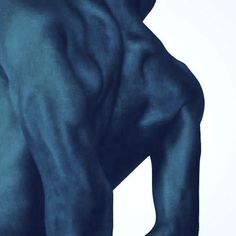 the back of a man's body is shown in this artistic photo, which appears to be blue