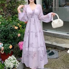 With Floral Print Design, Deep V-Neck And Bow At Front Unused Light Purple Long Dress, Wisteria Clothes, Lavender Dress Long, Purple Flowy Long Sleeve Maxi Dress, Purple V-neck Chiffon Dress, Casual Lavender V-neck Maxi Dress, Feminine Purple V-neck Maxi Dress, Deep Purple Dress, Purple Chiffon V-neck Maxi Dress