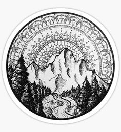 a round sticker with mountains and trees on it