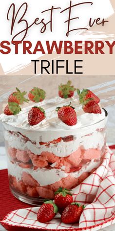 the best ever strawberry trifle recipe in a glass dish with strawberries on top