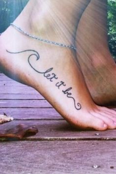 a woman's foot with the words, let the sea set you free