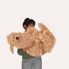 a woman holding a dog in her arms and hugging it's face with both hands