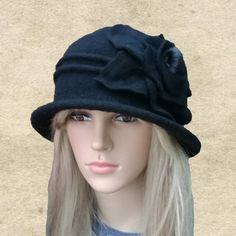 This felted wool cloche hat is very warm. It's perfect to wear in fall/winter seasons. The hat is lightweight and easy to wear. It's well match with any outfits.One size fits most an average women's head (21.5" - 22.5")Composition: 100% WoolHand wash in cold water and lay flat to dry. Do not use a dryer!NOTEActual color may slightly different depending on your monitor.Please contact us if you have any questions for the color. Winter Brimmed Felt Hat, Winter Felt Brimmed Cloche Hat, Winter Wool Cloche Hat, Winter Wool Cloche Felt Hat, Brimmed Felt Cloche Hat For Winter, Winter Felt Cloche Hat With Brim, Winter Fedora With Short Brim In Fur Felt, Fur Felt Fedora With Short Brim For Winter, Wool Fedora With Curved Brim For Winter