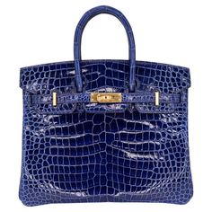 Brand: Hermès Style: Birkin Size: 25cm Color: Bleu Saphir Material: Shiny Porosus Crocodile Hardware: Gold Hardware (GHW) Dimensions: 10" W x 7.5" H x 4.75" D Handle Drop: 4" Night Luxe, Drainage Massage, Hermes Style, Nike Fashion Shoes, Blue Handbags, Favorite Handbags, Kelly Bag, Croc Print, Luxury Purses