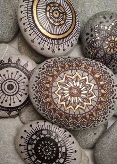 some rocks with different designs on them