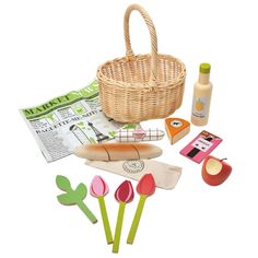 the contents of a picnic basket are laid out