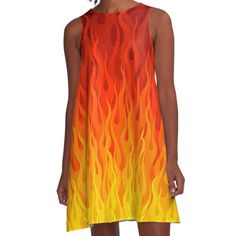 a women's dress with orange and yellow flames on the front, as if it were