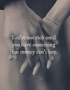 two hands holding each other with the words you're not rich until you have something that money can't buy