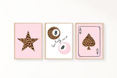 three cards with different designs on them, one in pink and the other in leopard print