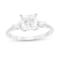 a princess cut diamond engagement ring with baguets