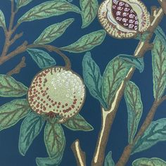 a painting of pomegranates and leaves on a dark blue wallpaper