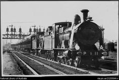 an old black and white photo of a train