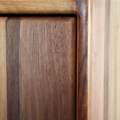 a close up view of the wood grain on this cabinet door