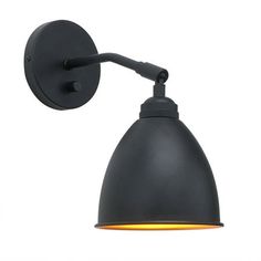 a black wall light with an orange light on the top and bottom corner, against a white background