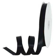 a roll of black satin ribbon on a white background