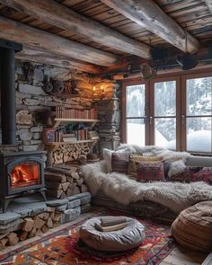 a living room filled with lots of furniture and a fire place next to a window