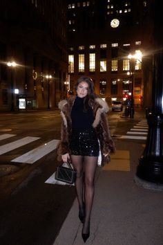 sequin mini skirt | black sequin mini skirt | black mini skirt | Black paten leather heels | black closed toe heels outfit | fur coat | short brown fur coat | short fur coat | fur coat outfit | date night outfit | Holiday outfit | new years eve outfit inspo | christmas outfit inspo | christmas eve outfit inspo | chanel purse | black chanel purse with silver hardwear | black sheer tights outfit | blowout hair style | Hair cut inspo | downtown at night photos | outfit photos at night | nighttime city photos | picture inspo | pose examples | blac heels tights and mini skirt outfit | chicago | winter outfit inspo | going out outfit inspo | girls night outfit inspo | skirt winter outfit | tights | tights outfit | tights and skirt outfit | black sheer tights outfit | black tights outfit Heels And Mini Skirt Outfit, Black Tights Heels Outfit, Black Tights And Heels Outfit, Black Sparkly Skirt Outfit, Christmas Outfit Night Out, Black Skirt Sheer Tights Outfit, Christmas Party Outfits Knee High Boots, Outfits With Sheer Tights, January Bday Outfit